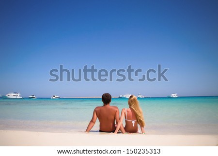 Boyfriend and girlfriend on the beach