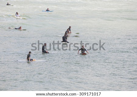 FRANCE, BIARRITZ - JULY 21, 2014: Learning to surf on the Atlantic coast.