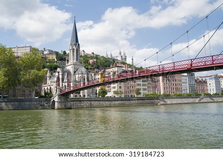 France, Lyon - August 3, 2013: Bridge Pasrel-Saint-Georges, leading to the church of Saint-Georges of the 19th century.