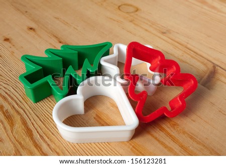 Christmas cookie cutters on the pastry board