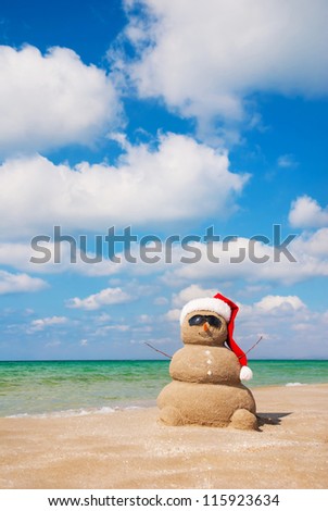 Sandy snowman. Holiday concept can be used for New Year\'s and Christmas Cards