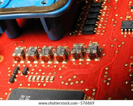 Red Circuit Board symbolic of high tech