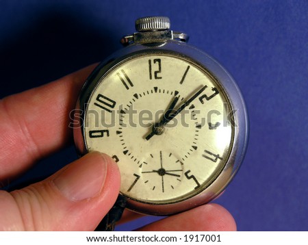 Pocket Watch with old yellowed face