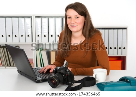 young reporter in editorial office