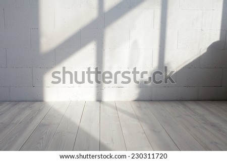 White empty loft interior with window shadow