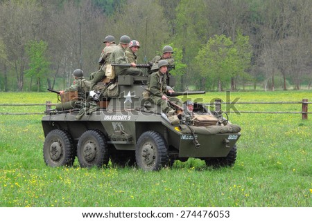 DOBRANY, CZECH REPUBLIC - MAY 1, 2015: American M8 Greyhound with soldiers. Liberation festival to 70th Anniversary of the Liberation by the US Army and the End of the Second World War in Europe.