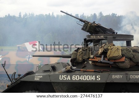 DOBRANY, CZECH REPUBLIC - MAY 1, 2015: American M8 Greyhound in attack. Liberation festival to 70th Anniversary of the Liberation by the US Army and the End of the Second World War in Europe.