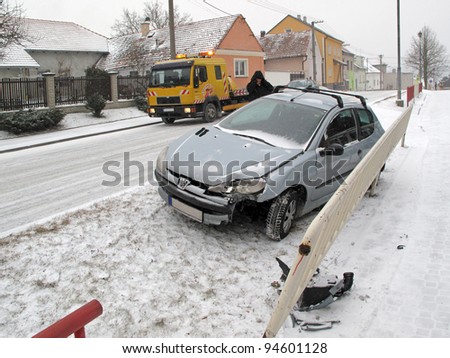 PILSEN, CZECH REPUBLIC - FEBRUARY 7: Peugeot 206 car damaged after crash on icy road, February 7 th, 2012 in Pilsen. Very cold weather and frost caused many car crashes in Western Europe, winter 2012.