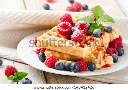 Waffles with berries. Selective focus
