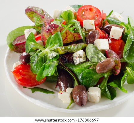Salad with feta and greek olives . Selective focus