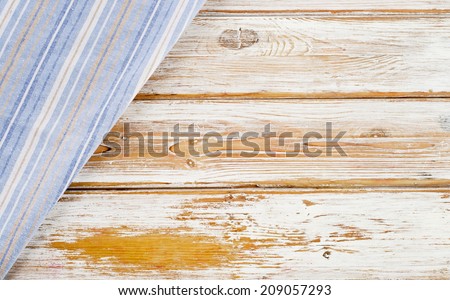 Blue napkin on a white wooden table