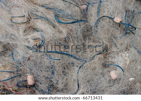A mass of fishing nets and floats.  These nets were found on the Coast of Central Java, Indonesia.