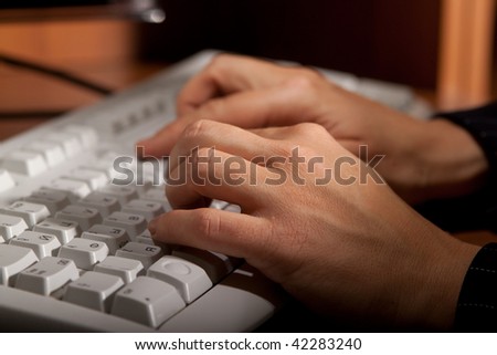 women's hands to print text on the keyboard