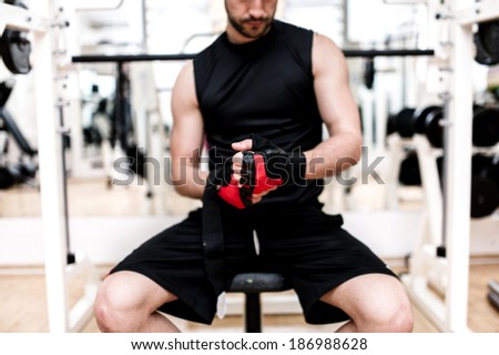 man at gym preparing for workout