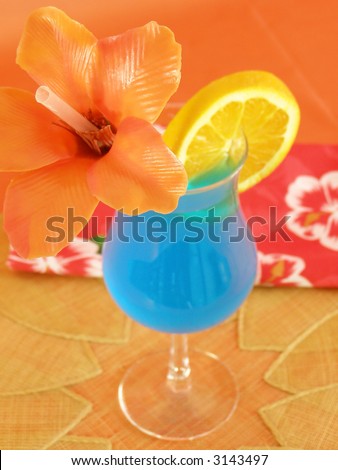 Blue Hawaii tropical beverage in a hurricane glass
