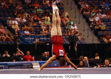 HARTFORD; CT - AUGUST 13: Gymnast Chris Brooks performs in the floor exercise during the men\'s competition at the VISA Nationals Gymnastics Championships on August 13, 2010 in Hartford, CT.