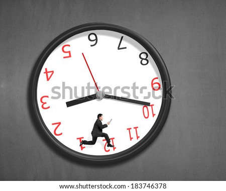 Running inside clock on concrete wall