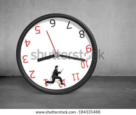 Running inside rolling clock on concrete ground