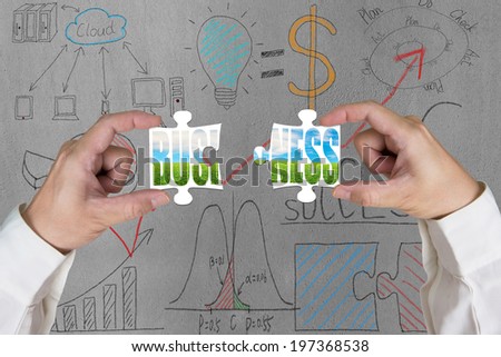 Assembling two puzzles for green business with doodles on concrete wall