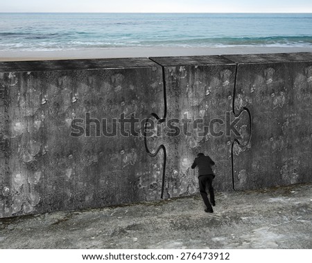 Man pushing huge puzzle door of concrete wall with sea beach background