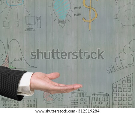 Empty open palm gesture of male hand with business concepts doodles on old green wooden wall background.