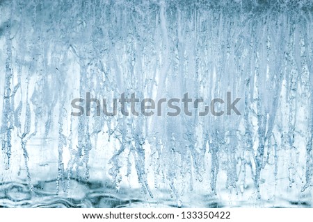 Background texture of big blue natural ice block with back light