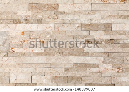 Architectural background texture. Wall made of marble blocks