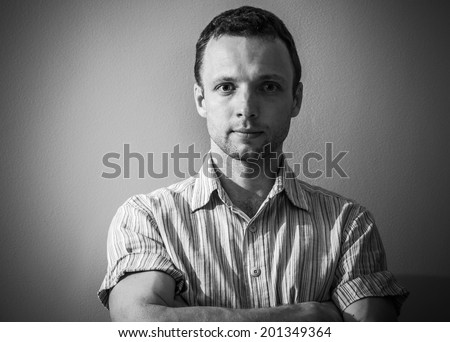 Black and white portrait of young Caucasian man