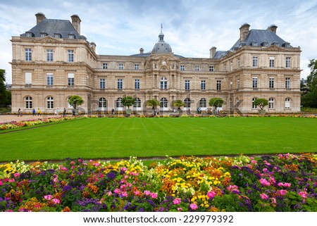 Paris, France - August 10, 2014: Luxembourg Palace facade and colorful flowers of the Luxembourg Garden in Paris