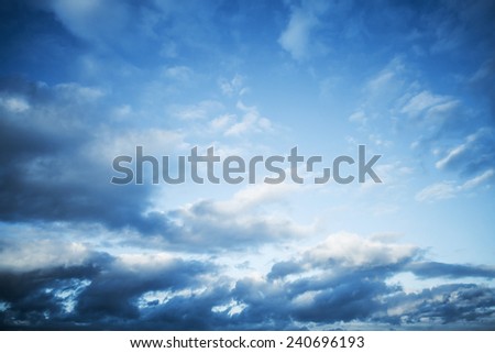 Dark blue sky with clouds, abstract nature background