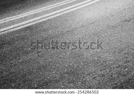 Abstract asphalt road fragment, automotive transportation background, double dividing line