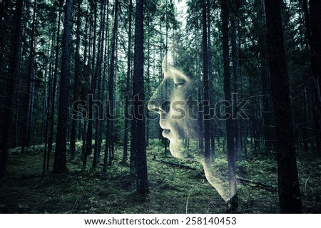 Double exposure photo concept with male face profile and dark green forest background. Green toned instagram retro style photo filter effect