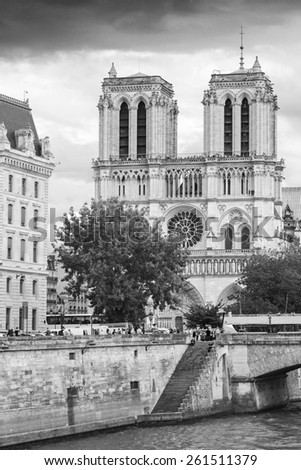 Notre Dame de Paris cathedral. The most popular city landmark of Paris, black and white photo