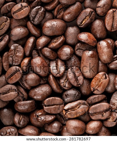 Closeup photo texture of dark rusted coffee beans