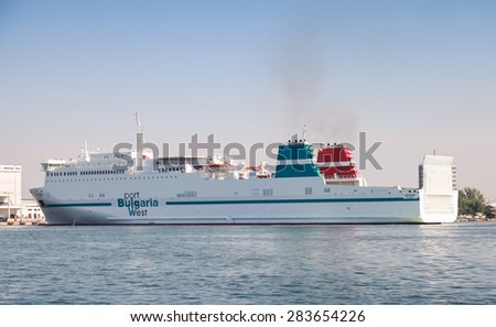 Burgas, Bulgaria - July 22, 2014: big white cargo ship moored in Fish port of Burgas, Bulgaria