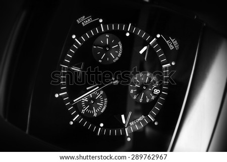 Luxury mens Chronograph Watch made of high-tech ceramics with sapphire glass. Close-up black and white studio photo with selective focus