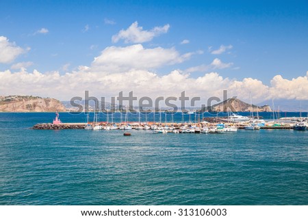 Port of Procida island with moored yachts and pleasure boats, Gulf of Naples, Italy