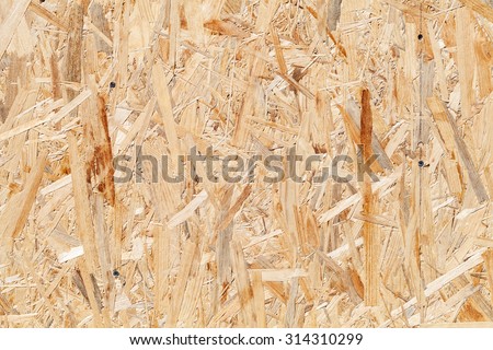 Oriented strand board OSB. Sterling board with screws background photo texture
