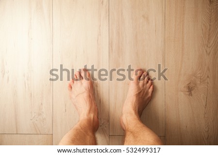 Similar – Image, Stock Photo Top view bare feet of male and female couple standing on wooden bridge