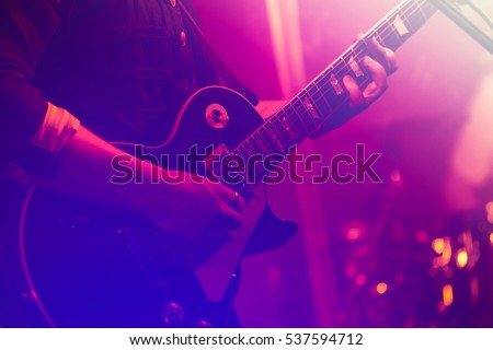 Similar – Image, Stock Photo Man with electric bass and bare feet on wooden bench on terrace in autumn