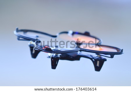 remote controlled quadcopter drone in mid air
