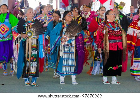 ARLEE, MONTANA - JULY 3: Native American women perform tribal dances at the 113th Annual Arlee Celebration Powwow. July 3, 2011 in Arlee, Montana