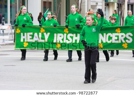 SAN FRANCISCO, CA - MARCH 17: A group of unidentified Irish dancers dressed in green during the St. Patric\'s Day Parade, March 17, 2012 in San Francisco, CA