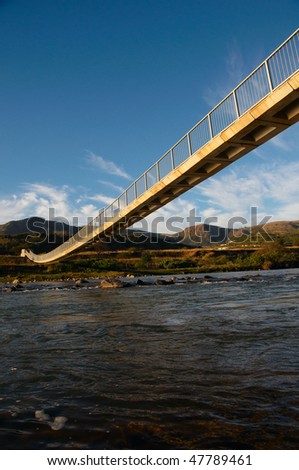 Pedestrian Bridge in rural South Africa over river where there are no roads