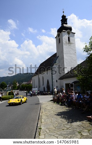 LUNZ, AUSTRIA - JULY 19: Ferrari Dino 246 GT on special stage by International Ennstal Classic 2013, a yearly tournament through Austria for vintage cars on July 19, 2013, in Lunz am See, Austria