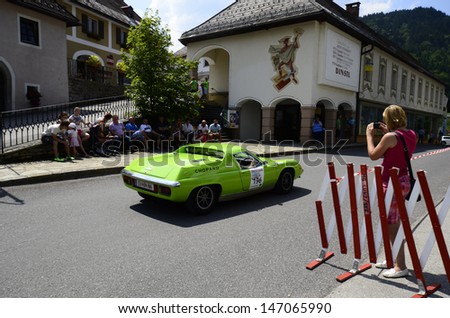 LUNZ, AUSTRIA - JULY 19: Lotus Europa on special stage by International Ennstal Classic 2013, a yearly tournament through Austria for vintage cars on July 19, 2013, in Lunz am See, Austria