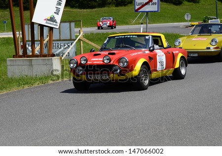 LUNZ, AUSTRIA - JULY 19: Fiat Abarth on special stage by International Ennstal Classic 2013, a yearly tournament through Austria for vintage cars on July 19, 2013, in Lunz am See, Austria