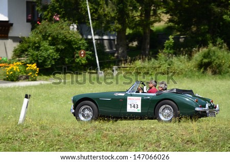 LUNZ, AUSTRIA - JULY 19: Austin Healy on special stage by International Ennstal Classic 2013, a yearly tournament through Austria for vintage cars on July 19, 2013, in Lunz am See, Austria