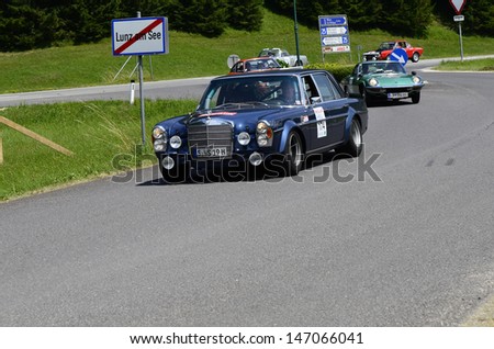 LUNZ, AUSTRIA - JULY 19: Mercedes 300 SEL/AMG on special stage by International Ennstal Classic 2013, a yearly tournament through Austria for vintage cars on July 19, 2013, in Lunz am See, Austria