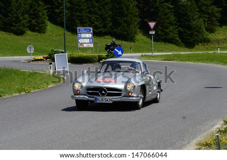 LUNZ, AUSTRIA - JULY 19: Mercedes 300 SL on special stage by International Ennstal Classic 2013, a yearly tournament through Austria for vintage cars on July 19, 2013, in Lunz am See, Austria